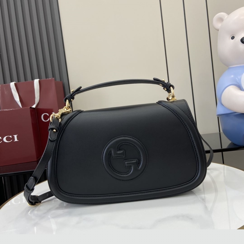 G*u*i top handle bags
